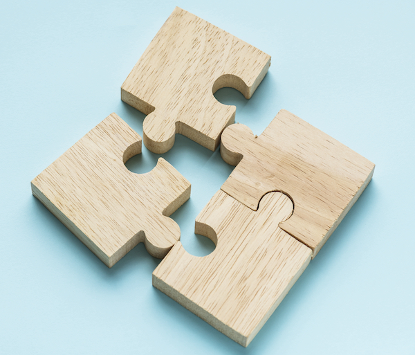 Jigsaw teamwork concept macro shot